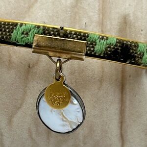 Catherine Page gold tone bangle with woven fabric, fresh water pearl dangle
